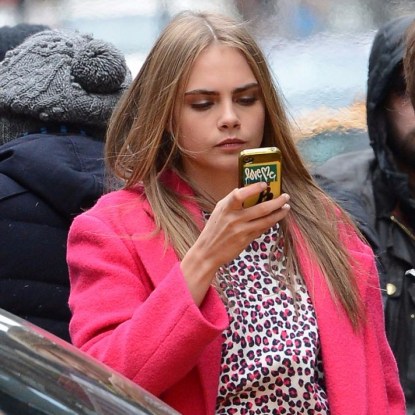 cara delavigne on phone